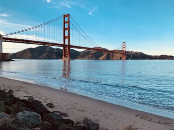 View of suspension bridge at beach