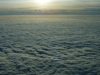 Sun shining through clouds