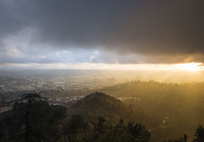 Scenic view of mountains against sky during sunset