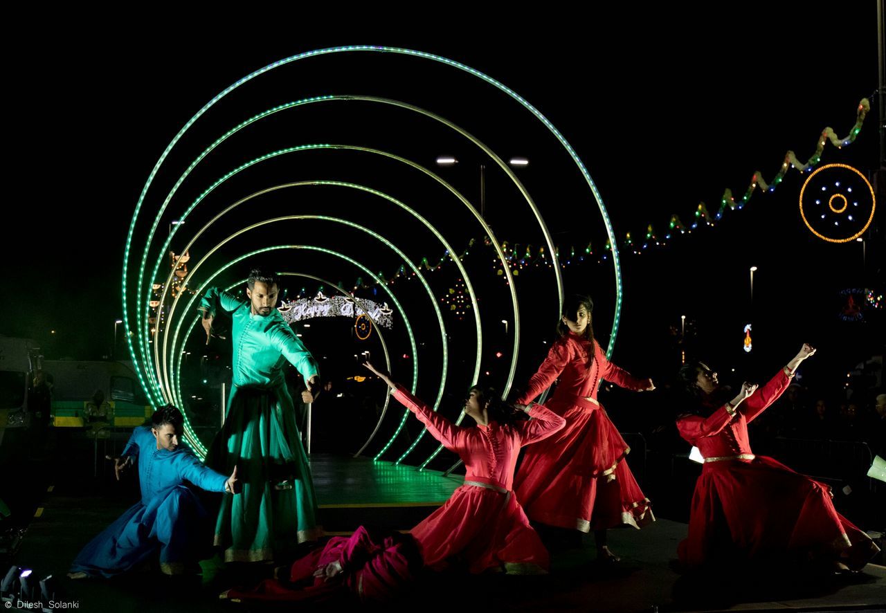 VIEW OF ILLUMINATED FERRIS WHEEL