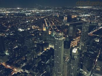 Aerial view of illuminated cityscape