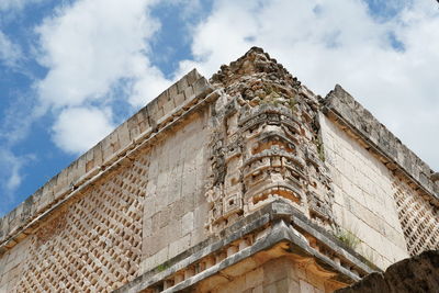 Low angle view of old building against sky