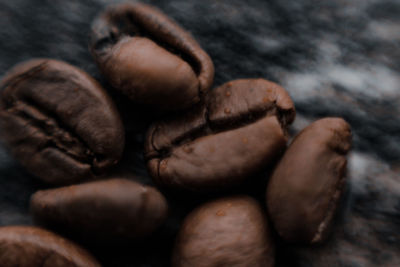 Close-up of coffee beans on table