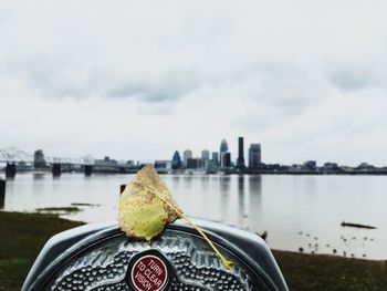 Close-up of cityscape against river
