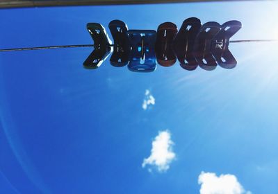 Low angle view of water against blue sky