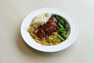 High angle view of food served in plate on table