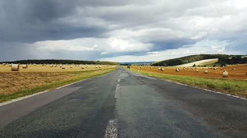 Road passing through rural landscape