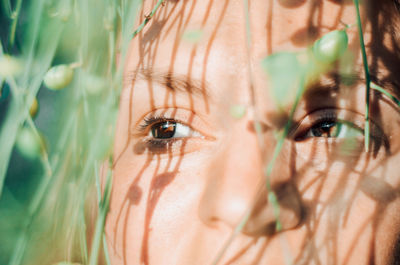 Close-up of young woman thoughtful woman looking away