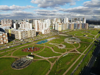 High angle view of buildings in city against sky