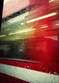 Reflection of train on glass window