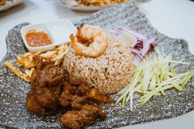 Close-up of food served on table