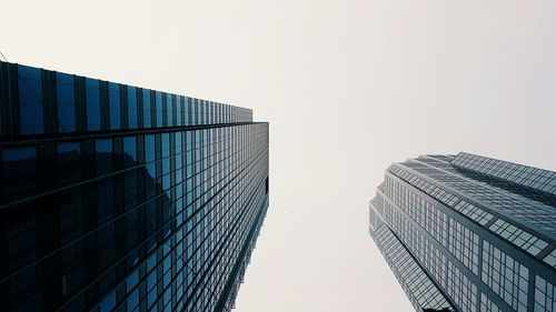 Low angle view of modern buildings against clear sky