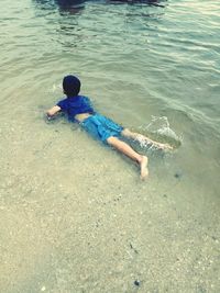 High angle view of boys on beach