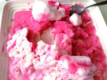 Close-up of pink ice cream in container