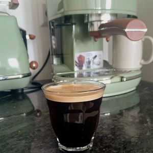 Close-up of coffee cup on table