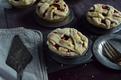 High angle view of mini pies on table