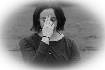 Portrait of young woman looking away