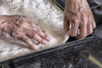 Close-up of person preparing food