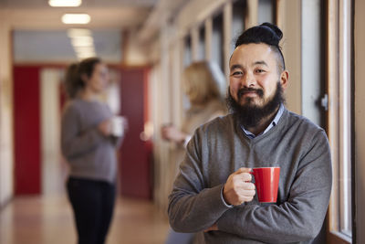 Man standing at corridor