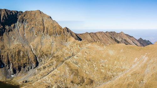 Aerial view of mountains against sky