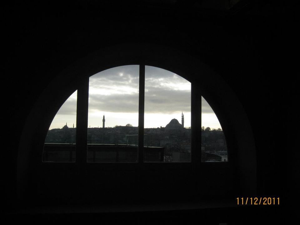 indoors, window, sky, arch, built structure, architecture, glass - material, silhouette, transparent, cloud - sky, transportation, cloud, dark, looking through window, vehicle interior, sunset, no people, landscape, nature, road