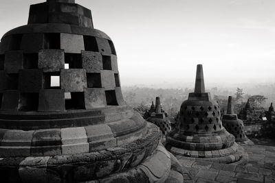 Ancient temple against sky