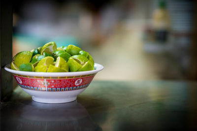 Close-up of fruits in bowl on table