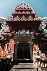 Low angle view of temple building against sky