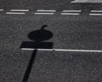 High angle view of shadow on road