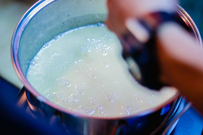 Close-up of hand holding ice cream