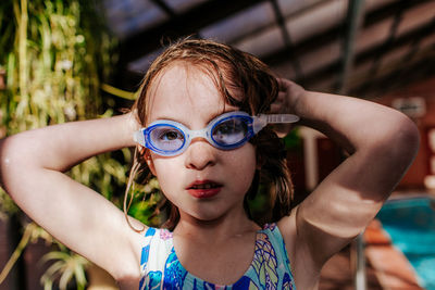 Portrait of a girl with swimming pool