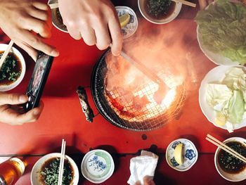 Cropped image of hand holding ice cream