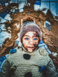 Portrait of smiling girl in snow