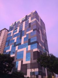 Low angle view of skyscraper against clear sky