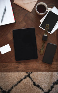 High angle view of coffee cup on table