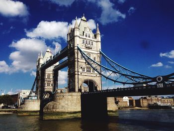 Low angle view of tower bridge against sky