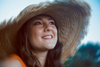 Close-up of smiling young woman