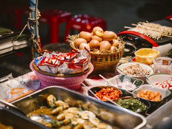 Various fruits on table at market stall