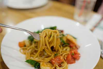 Close-up of spaghetti served in plate