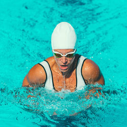 Female athlete swimming in pool