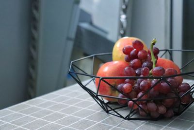 Close-up of fruits on table at home