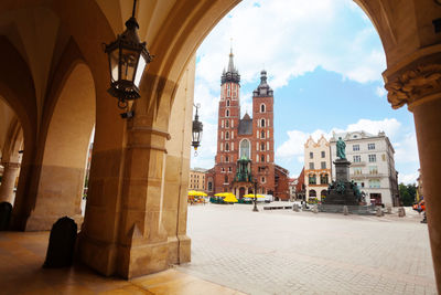 Buildings in city against sky