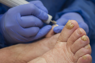 Close-up of human hand holding hands