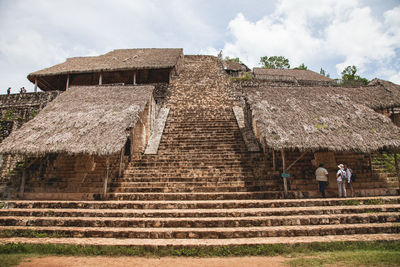 Low angle view of people on steps