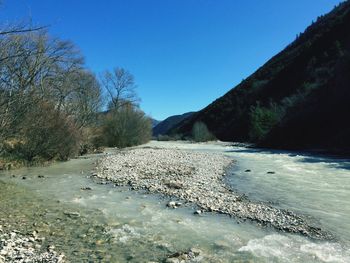 Scenic view of calm sea against clear sky