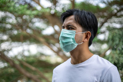 Portrait of young man outdoors