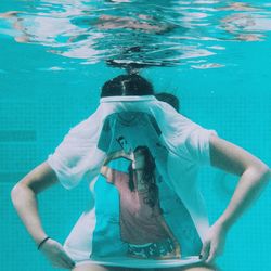 Woman swimming in pool