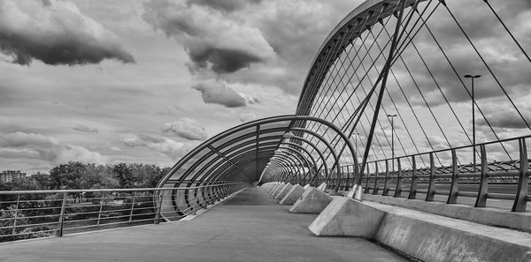 View of bridge against cloudy sky