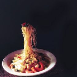 Close-up of food against black background