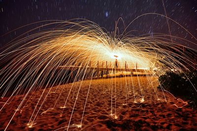 Close-up of illuminated firework display at night